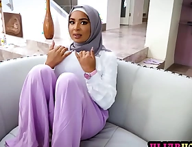 Arab teen with hijab and Halloween custome cry out for her nerves calmed