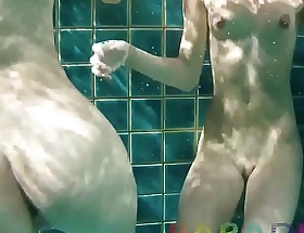 Fox set of two swim naked and let boyfriend fuck them submersed